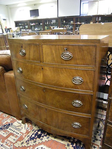 Lot 120 - A 19th Century mahogany bow front chest