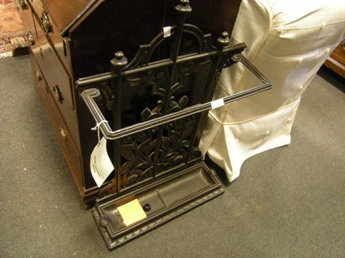 Lot 49 - A cast iron stick stand