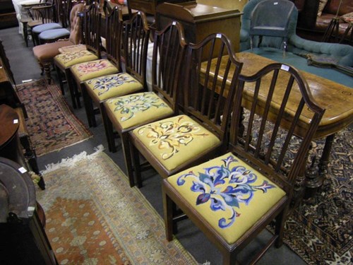 Lot 43 - A set of six George III mahogany dining chairs
