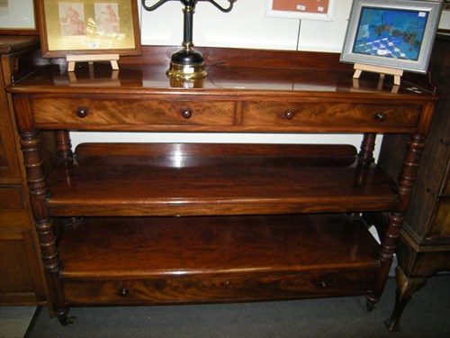 Lot 31 - A William IV mahogany three tier buffett, ex...