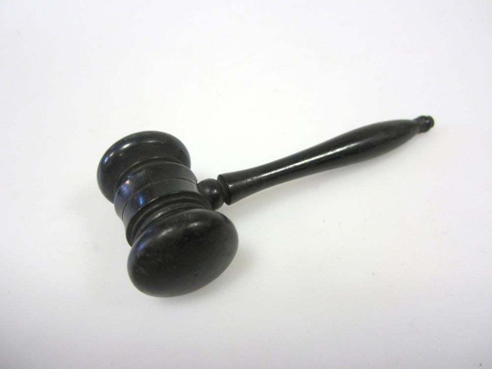 Lot 680 - A miniature ebony gavel