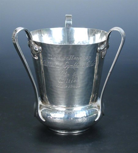 Lot 259 - An Edwardian silver Arts and Crafts style Loving Cup or Tyg