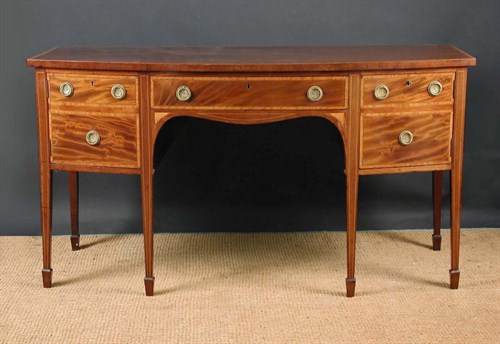 Lot 664 - A Regency mahogany bow front sideboard