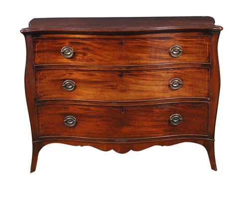 Lot 838 - A George III Hepplewhite mahogany serpentine commode, circa 1790