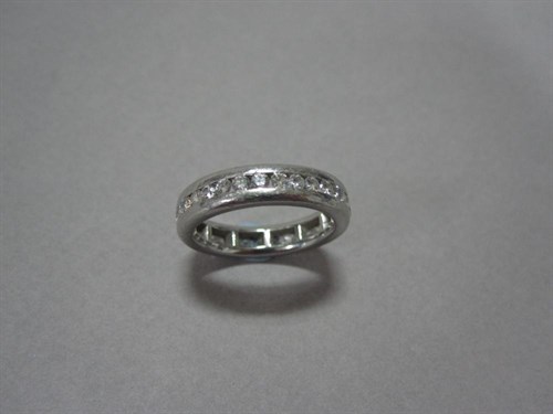 Lot 156 - A full hoop diamond eternity ring