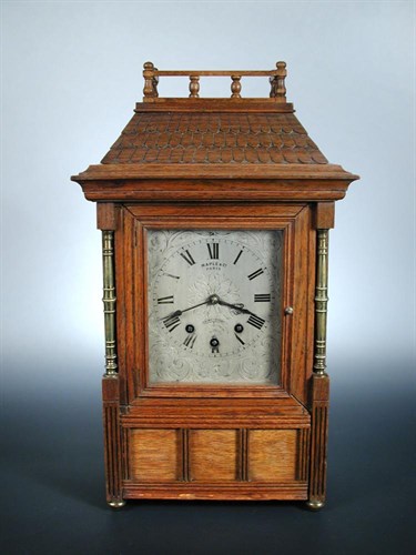 Lot 637 - An oak chiming mantel clock marked for Maple & Co. Paris, circa 1900