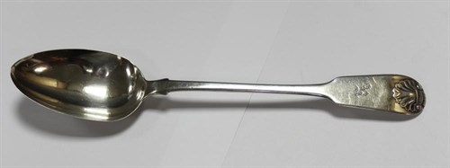 Lot 291 - An early Victorian silver fiddle and shell pattern stuffing spoon