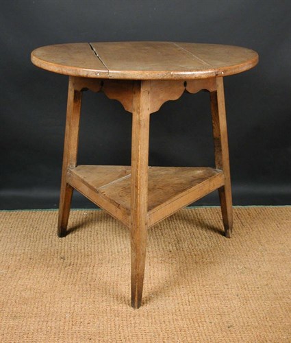 Lot 647 - An 18th century sycamore cricket table