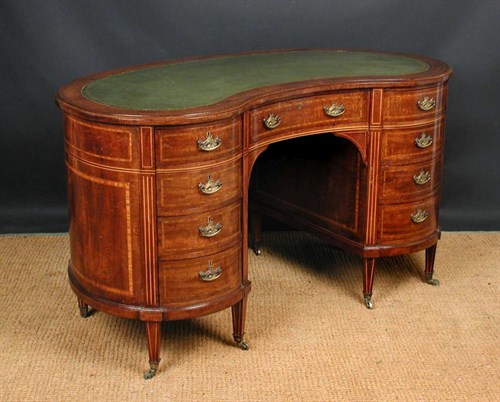 Lot 742 - A 19th century mahogany kidney shaped writing desk, circa 1870