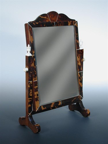 Lot 609 - An early 20th century tortoiseshell framed dressing table mirror