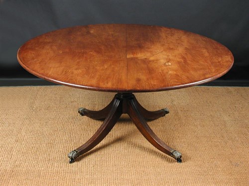 Lot 680 - A George III and later mahogany pedestal supper table