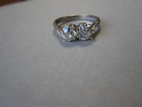 Lot 175 - An old cut two stone diamond ring