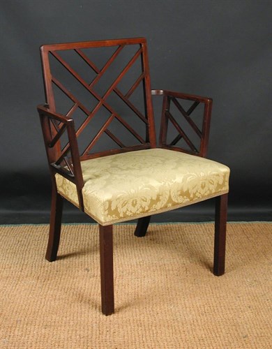 Lot 693 - A George III mahogany cockpen chair