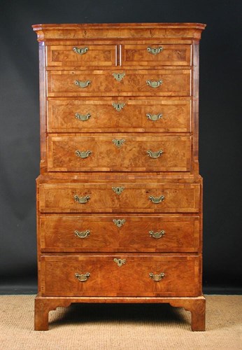 Lot 662 - A George I walnut chest on chest