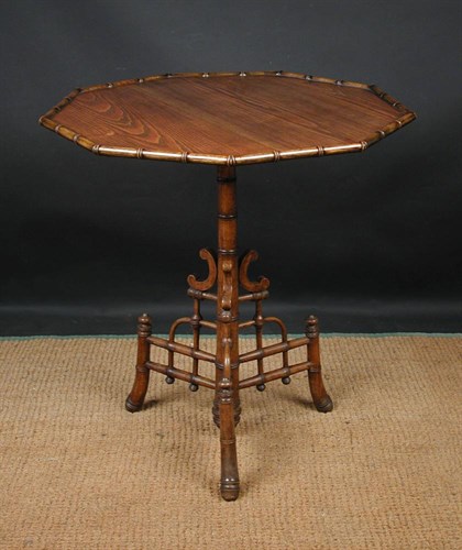 Lot 750 - A late 19th century ash and beechwood faux bamboo tripod table, circa 1880