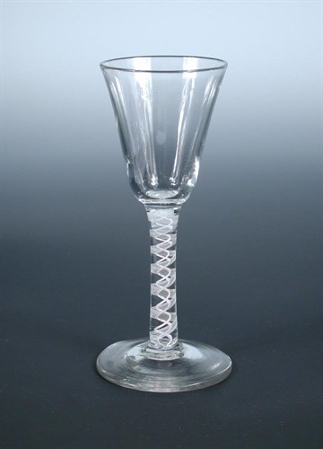 Lot 125 - An 18th century opaque twist wine glass