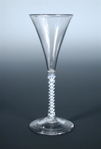 Lot 94 - An 18th century opaque twist wine glass
