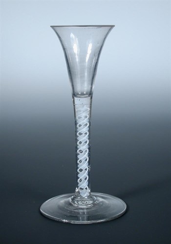 Lot 95 - An 18th century double helix opaque twist wine glass
