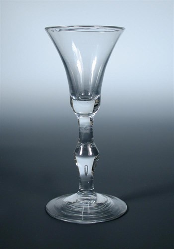 Lot 104 - A mid 18th century wine glass