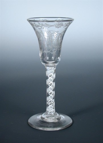 Lot 105 - An 18th century opaque twist wine glass