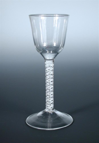 Lot 119 - An 18th century opaque twist wine glass