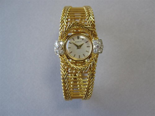 Lot 155 - An 18ct gold and diamond set lady's dress watch by Gübelin