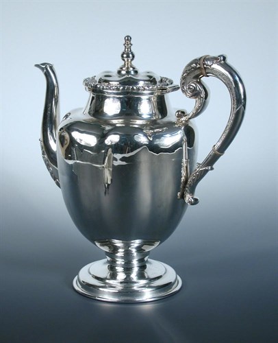 Lot 225 - A Mexican metalwares coffee pot