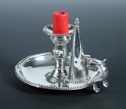 Lot 287 - A George III silver chamberstick