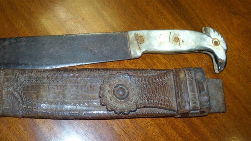 Lot 539 - A mid 20th century Collins 'Legitmus' machete and leather scabberd