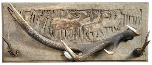 Lot 618 - An early 20th century oak and  antler coat rack