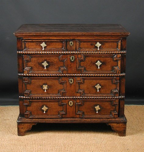 Lot 659 - A 17th century oak chest of drawers, circa 1670