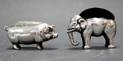 Lot 300 - A small  silver Britannia standard pincushion modelled as an elephant