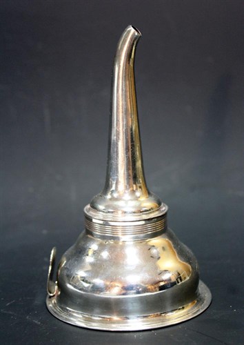 Lot 284 - A George III silver wine funnel and strainer