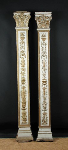 Lot 749 - A pair of carved wood and parcel gilt pillasters