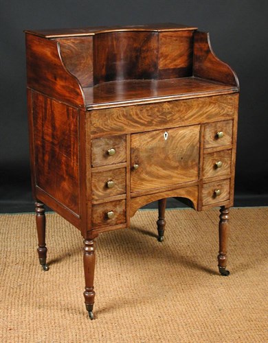 Lot 702 - A Regency mahogany gallery back wash stand