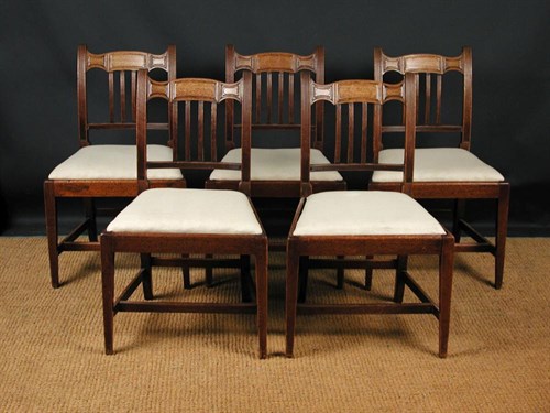 Lot 704 - A set of five Regency mahogany dining chairs