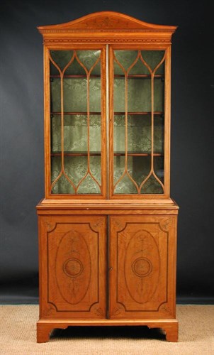 Lot 668 - A Sheraton revival satinwood bookcase