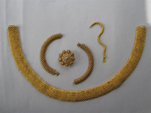 Lot 172 - A nearly pure gold (23¾ct) Thai filigree and beadwork bracelet together with other chains in the same pattern