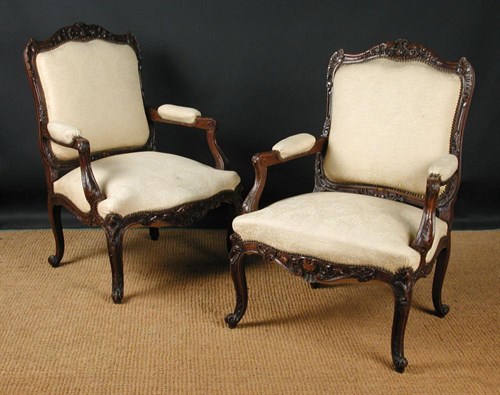 Lot 744 - A pair of Regence revival walnut Fauteuil, circa 1900