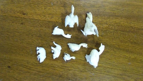 Lot 554 - Eight early 20th century carved ivory ducks, a bear and an elephant
