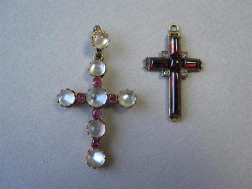 Lot 139 - A moonstone and ruby Latin cross together with another similar gemset cross