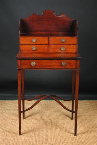 Lot 671 - A Sheraton revival mahogany writing table by Collinson & Lock, circa 1890