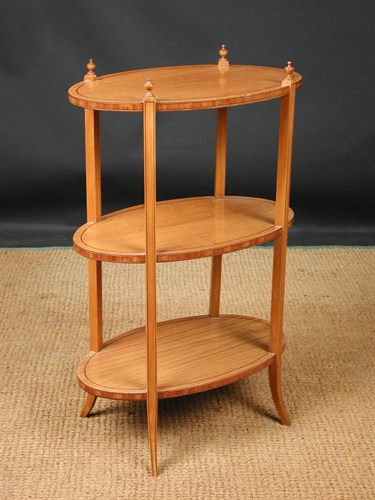 Lot 706 - A small Edwardian mahogany satinwood etagere, circa 1910