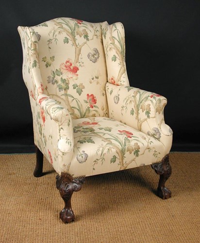 Lot 675 - A George III revival mahogany wing back armchair, circa 1870