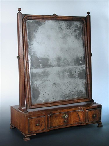 Lot 650 - An early 18th century walnut dressing table mirror, circa 1720