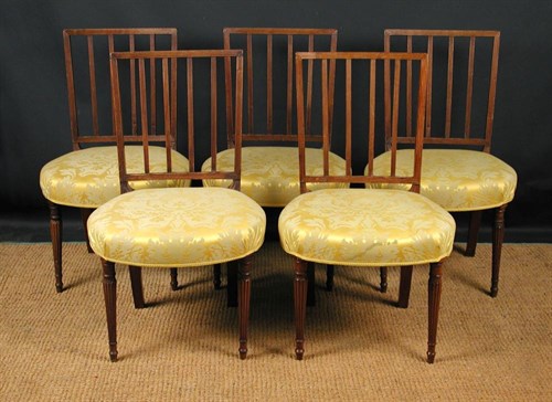 Lot 676 - A set of five Regency rail back mahogany...