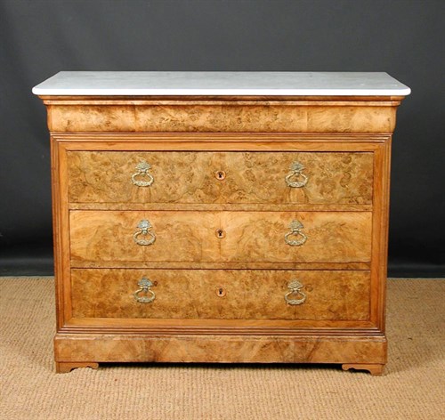 Lot 728 - A Biedermeier burr walnut and marble commode