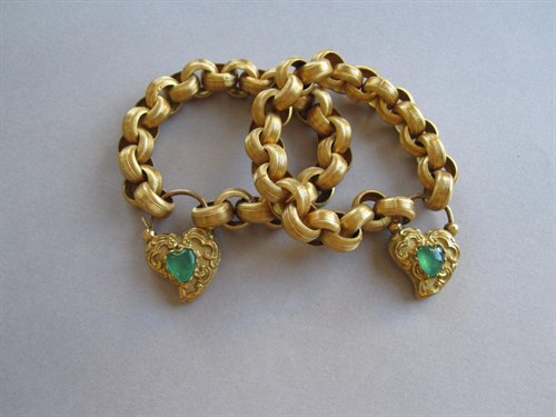 Lot 184 - A pair of 19th century chain and locket bracelets