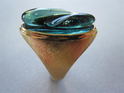 Lot 181 - A contemporary carved teal blue tourmaline ring