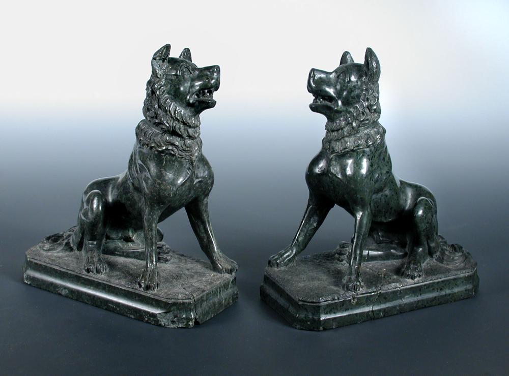 Lot 560 - A pair of 19th century serpentine 'Dogs of Alciabides'